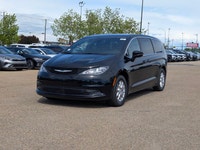 The 2026 Chrysler Grand Caravan SXT in Diamond Black Crystal Pearl with a Black interior offers a bl... (image 1)
