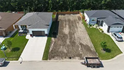 P01//Portage La Prairie/This lot is fully serviced with hydro, water, sewer, gas hook ups, and is re...