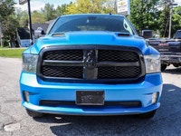 The 2021 Ram 1500 Classic Express 4x4 Crew Cab 57 Box is ready to tackle any road with its striking... (image 1)