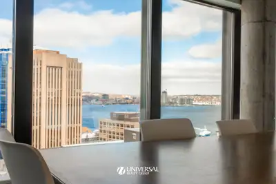 Spanning 12 floors and approximately 125,356 SF in total, the building features a modern exterior wi...