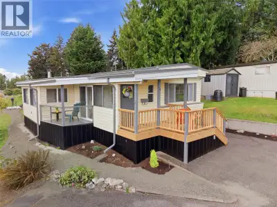 Guiding You Home… to Ocean views and a beautifully updated modular home in a quiet, tree-lined, adul...