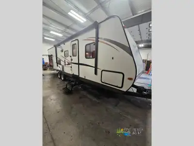 The Sportsmen Show Stopper LE S320BHLKSS travel trailer by KZ offers a single slide and a rear bunk...