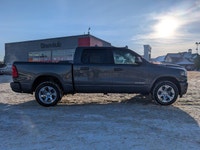 The 2026 Ram 1500 Big Horn Crew Cab in Granite Crystal Metallic combines rugged capability with refi... (image 7)