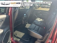 Experience the bold presence of the 2023 Ram 1500 Laramie in stunning red with the unstoppable 44 dr... (image 6)