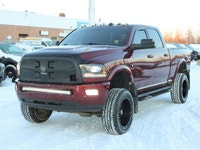This 2017 Ram 3500 Laramie is a no accidents heavy-duty diesel truck that stands out with a lift kit... (image 8)