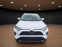 Price includes $1,000 finance credit. Price does not include fees or taxes. The 2024 White Toyota RA... (image 1)