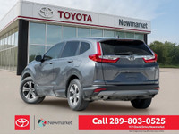 Experience the versatility and comfort of the 2018 Honda CR-V LX AWD in a sophisticated gray finish,... (image 4)