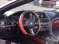 Experience the thrill of open-air driving in this stunning 2018 BMW 6 Series 650i xDrive Convertible... (image 8)