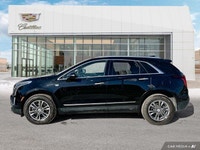 The 2021 Cadillac XT5 Premium Luxury includes a panoramic roof, ventilated front seats, heated rear... (image 1)