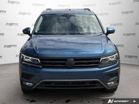 This Volkswagen Tiguan boasts a Intercooled Turbo Regular Unleaded I-4 2.0 L/121 engine powering thi... (image 8)