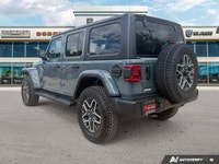 This Jeep Wrangler has a trusty Regular Unleaded V-6 3.6 L/220 engine powering this Automatic transm... (image 2)