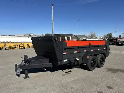 Precision dump trailer, 14’ long x 7’ wide, with 6’ slide in ramps. Standard Options: 16” Centered C...