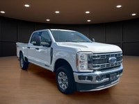 The 2023 Ford Super Duty F-250 SRW XLT in striking white comes equipped with a robust 4x4 drivetrain... (image 3)