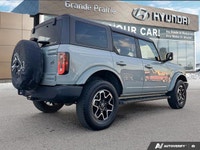 Embrace the spirit of adventure with the 2022 Ford Bronco. This stunning Shadow Black convertible is... (image 5)