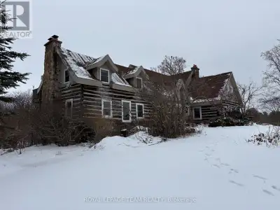 Escape to the country with this one-of-a-kind 5 bedroom log home set on a picturesque 2.25-acre tree...