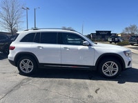 This 2023 Mercedes-Benz GLB 250 Sport Utility, presented in crisp Polar White, redefines compact lux... (image 3)