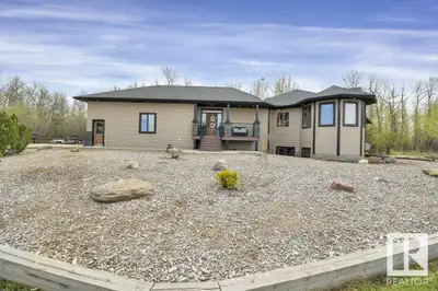 70.36 acres with a Gorgeous custom built 2088sq/ft home. ICF construction from basement to roof. Pow...