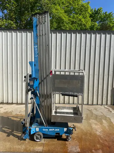 Priced at $1,800 + Tax, this Genie AWP365 mast lift is a low-cost entry into vertical access. Batter...