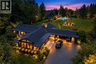 An exceptional expression of mid-century modern design, privately set on 4.6 acres of breathtaking n...