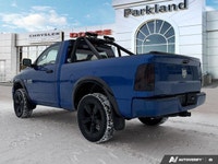 KBB.com 15 Best Family Cars. This Ram 1500 boasts a Regular Unleaded V-8 5.7 L/345 engine powering t... (image 3)