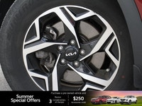 Navigate urban streets and weekend adventures with ease in the striking red 2023 Kia Sportage LX. Th... (image 8)