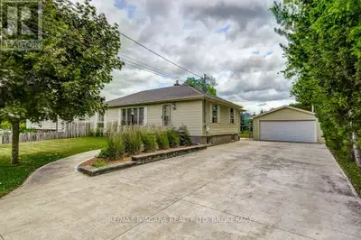 This spacious bungalow offers 1,575 sqft of main floor living and sits on an incredible 75 x 173 ft...