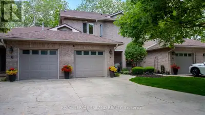Location, location, location!!! Rarely available 2 storey condo with attached garage, plus 2 car dri...