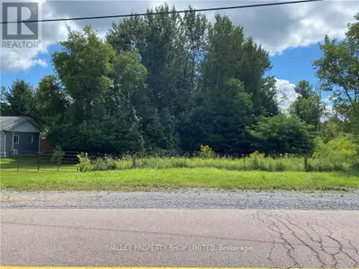 18.59 Acre Property with Some Industrial Zoning. ** Property currently has no road access ** Please...