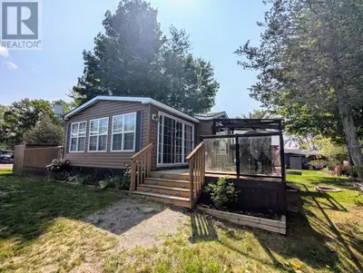 Escape to your own waterfront retreat at Cherry Beach Resort in Prince Edward County. This 2012 Nort...