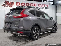 The 2018 Honda CR-V Touring AWD delivers premium comfort, advanced safety, and confident all-weather... (image 5)