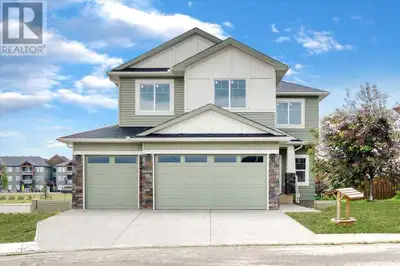 **Brand New 4-Bed, 3-Bath Home on the Largest Lot in Strathmore Lakes – With Spice Kitchen & Lot is...