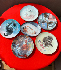 Multiple cat collectible plates from Bradford Exchange…