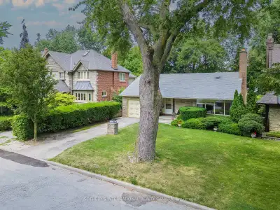 Nestled on the highly coveted Cortleigh Boulevard, this enchanting 4-bedroom, 3-bath bungalow offers...
