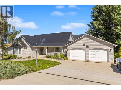 11523 Pretty Rd is a rare find in Lake Country: 3,130 sq ft of updated living space with a legal Air...