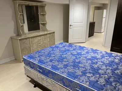 Spacious room for rent for a female or two females to rent a basement but share kitchen and washroom...