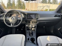 The 2019 Volkswagen Jetta Highline, presented in eye-catching Habanero Orange Metallic with a sophis... (image 9)