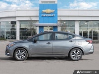 Navigate cityscapes with confidence in this sophisticated former daily rental 2024 Nissan Versa SV.... (image 1)