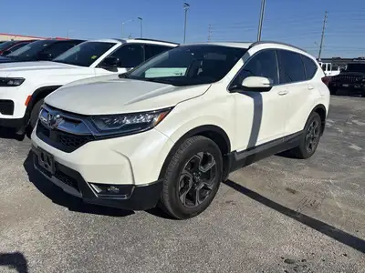 Trade In Vehicle**Honda**CRV**Touring**All Wheel Drive**Leather Seats**Heated Seats**Heated Steering...