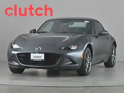 Auto Dimming Rearview Mirror, Front Heated Seats, Premium Sound System and more! Clutch is the large...