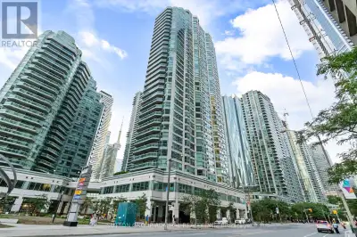 LUXURY LIVING AT WATERFRONT STUNNING CONDO OFFERING UNPARALLELED UPGRADES SCAVOLINI KITCHEN BATH BOO...