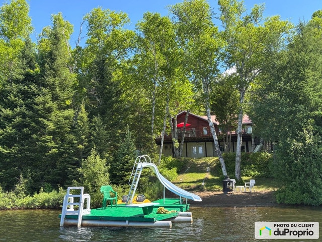$595,000 - Cottage for sale in St-Michel-Des-Saints — photo 1