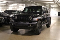 This Jeep Wrangler has a dependable Gas/Electric V-6 3.6 L/220 engine powering this Automatic transm... (image 3)