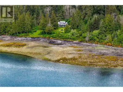 * PREC - Personal Real Estate Corporation. This custom-built Cape Cod-style residence offers an exce...