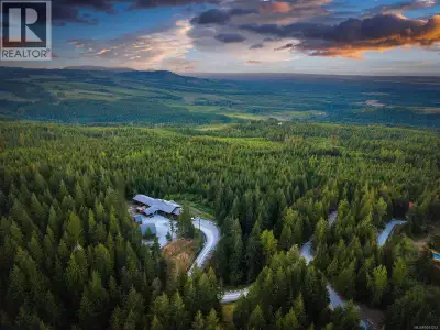 Escape to a private mountain paradise at this stunning luxury resort bordering Strathcona Park. Span...