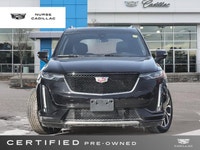 The 2025 Cadillac XT6 AWD Sport, dressed in a sophisticated Stellar Black Metallic exterior and a lu... (image 1)