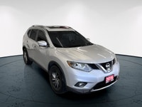 Meet the 2015 Nissan Rogue SL, a silver AWD SUV that perfectly combines robust handling with everyda... (image 2)