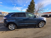 This 2016 Ford Edge SEL finished in Blue with a Black interior pairs a peppy EcoBoost 2.0L Turbo I4... (image 7)