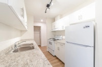 Amenities: Heat & Water Included • Security System • Quiet Buildings Suite & Building: One-bedroom a... (image 1)