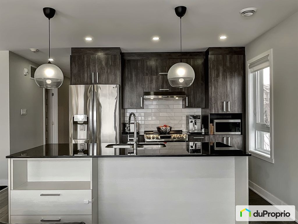 $420,000 - Condominium in Pointe-Aux-Trembles / East Montreal — photo 1