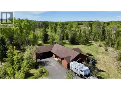 Beautiful 12+ acre country property offering a unique blend of open pasture, mature trees, and windi...